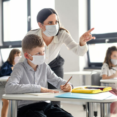 Teacher,And,Children,With,Face,Mask,Back,At,School,After